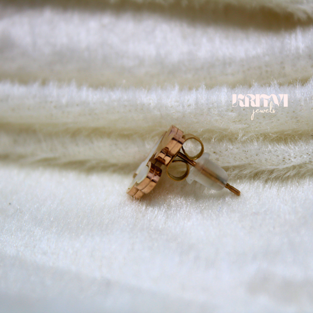 Rose gold-toned necklace featuring a butterfly pendant with a white inlay on one of the butterfly's wings - Image 3